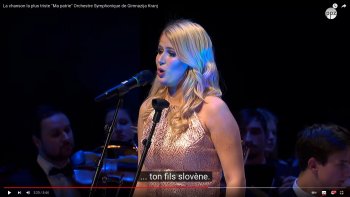 Chanté par la soprane   Ernistana Jost ":C'est ma chanson la plus triste"Avec l'orchestre symphonique, de Gimnazija-kianj..